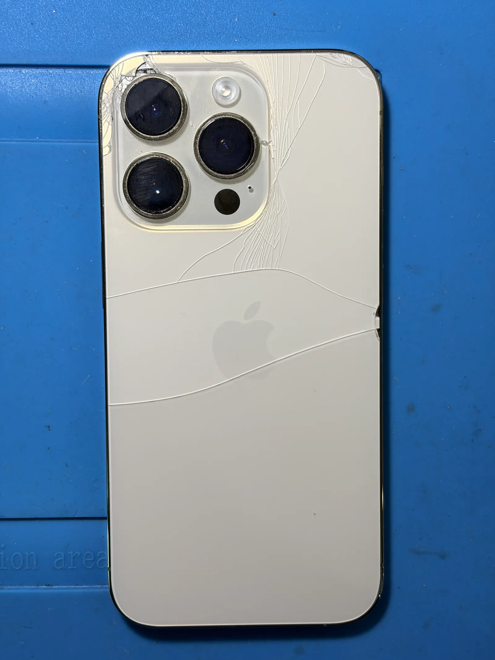 iPhone 14 Pro back housing replacement and back glass repair before and after - before